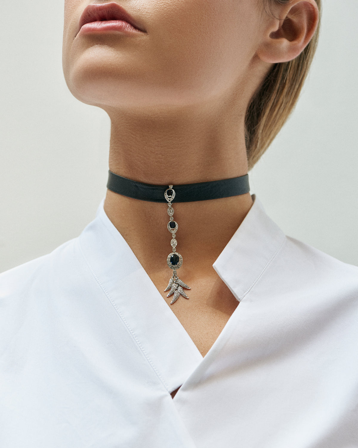 Black Butter Sapphire Leaf Choker, photographed on a model
