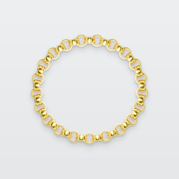 Rolo Chain Bracelet in solid gold, photographed flat on a pale grey studio surface